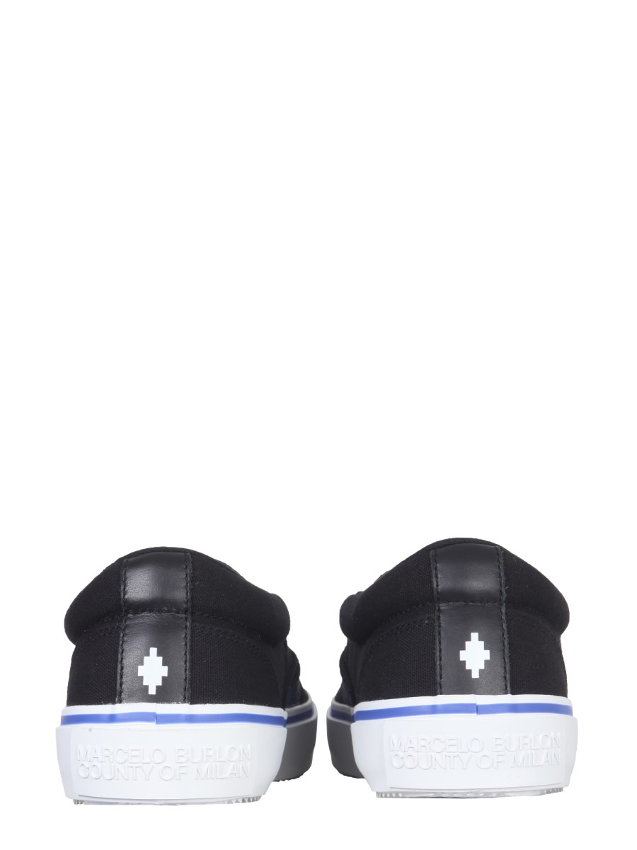 MARCELO BURLON COUNTY OF MILAN SLIP-ON VULCANIZZATE IN COTONE CON STAMPA WINGS
