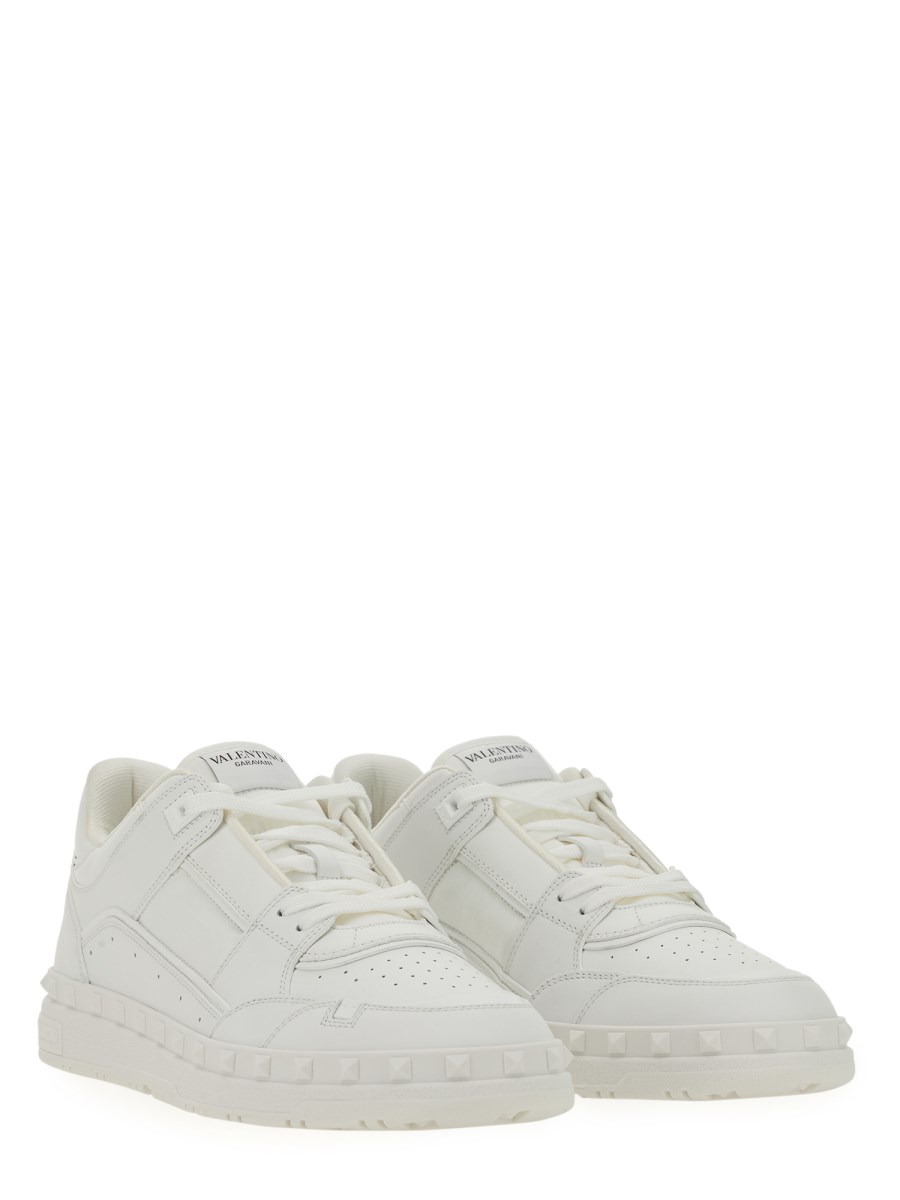 VALENTINO GARAVANI SNEAKER LOW TOP "FREEDOTS" IN PELLE