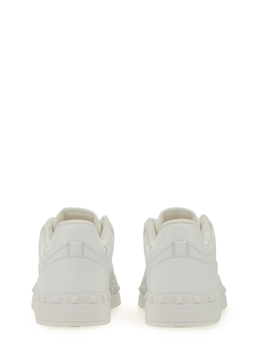 VALENTINO GARAVANI SNEAKER LOW TOP "FREEDOTS" IN PELLE