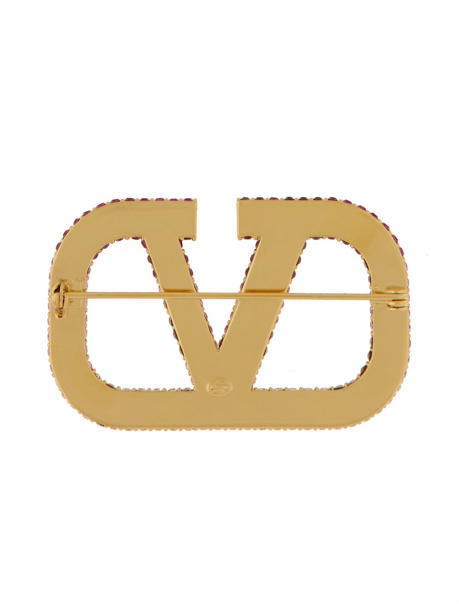VALENTINO GARAVANI SPILLA "VLOGO SIGNATURE" IN METALLO E CRISTALLI SWAROVSKI