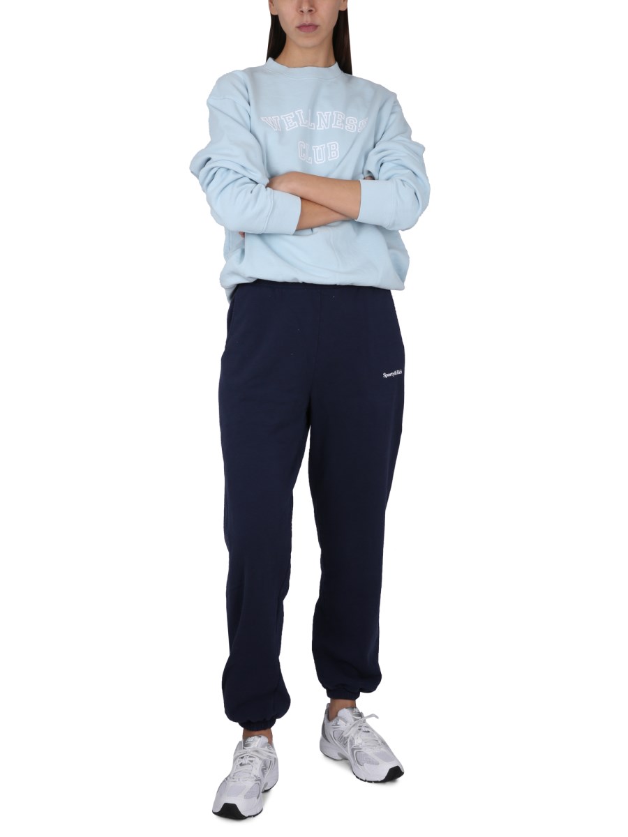 SPORTY&RICH FELPA IN COTONE CON LOGO FLOCCATO