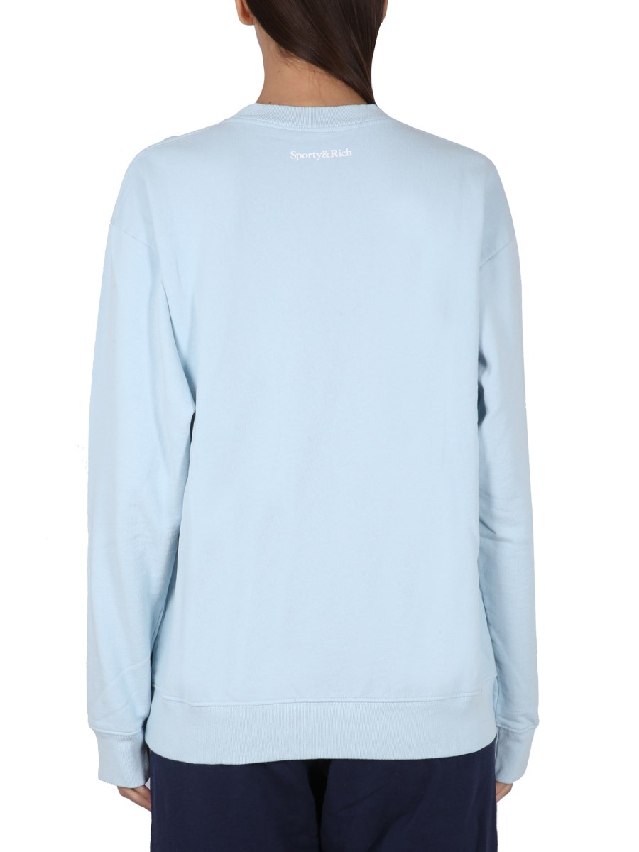 SPORTY&RICH FELPA IN COTONE CON LOGO FLOCCATO