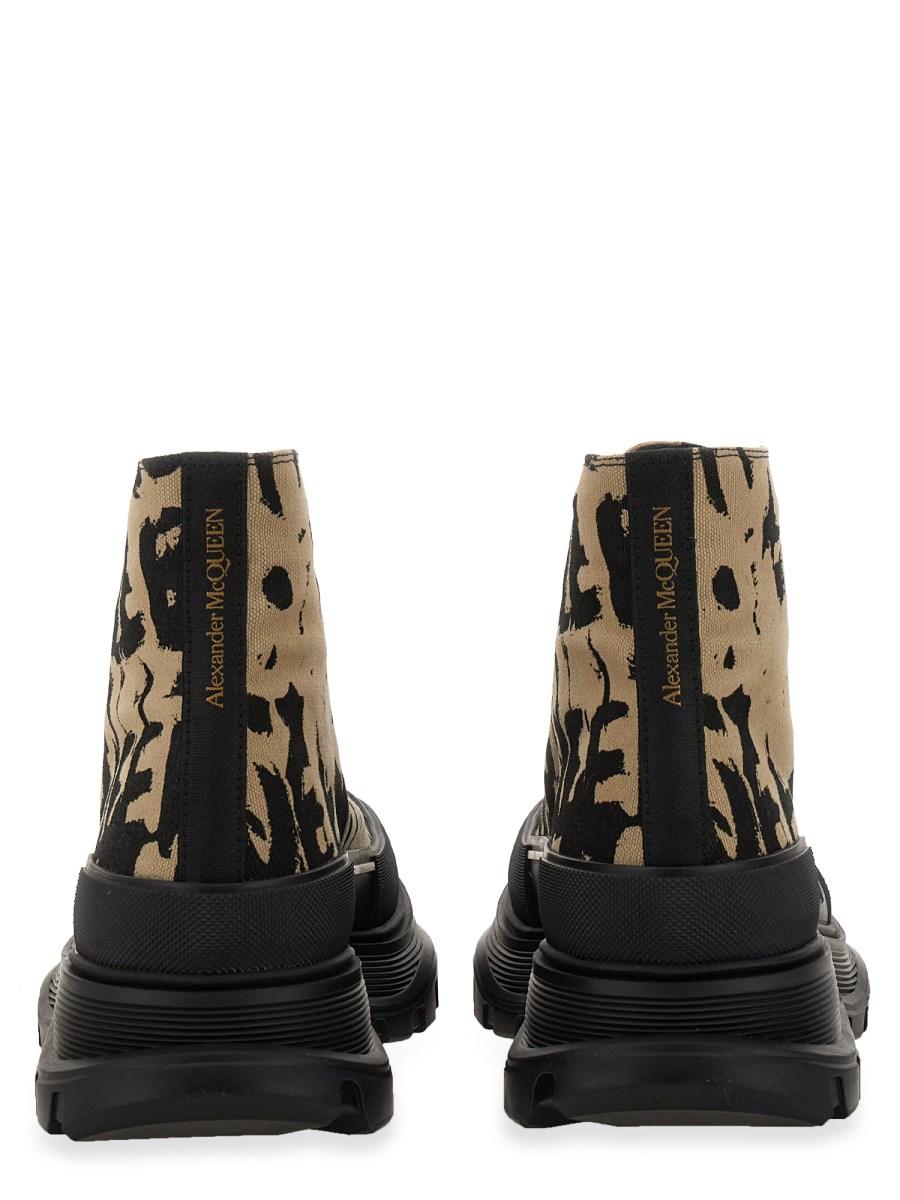 ALEXANDER McQUEEN STIVALETTI TREAD SLICK CON LOGO GRAFFITI