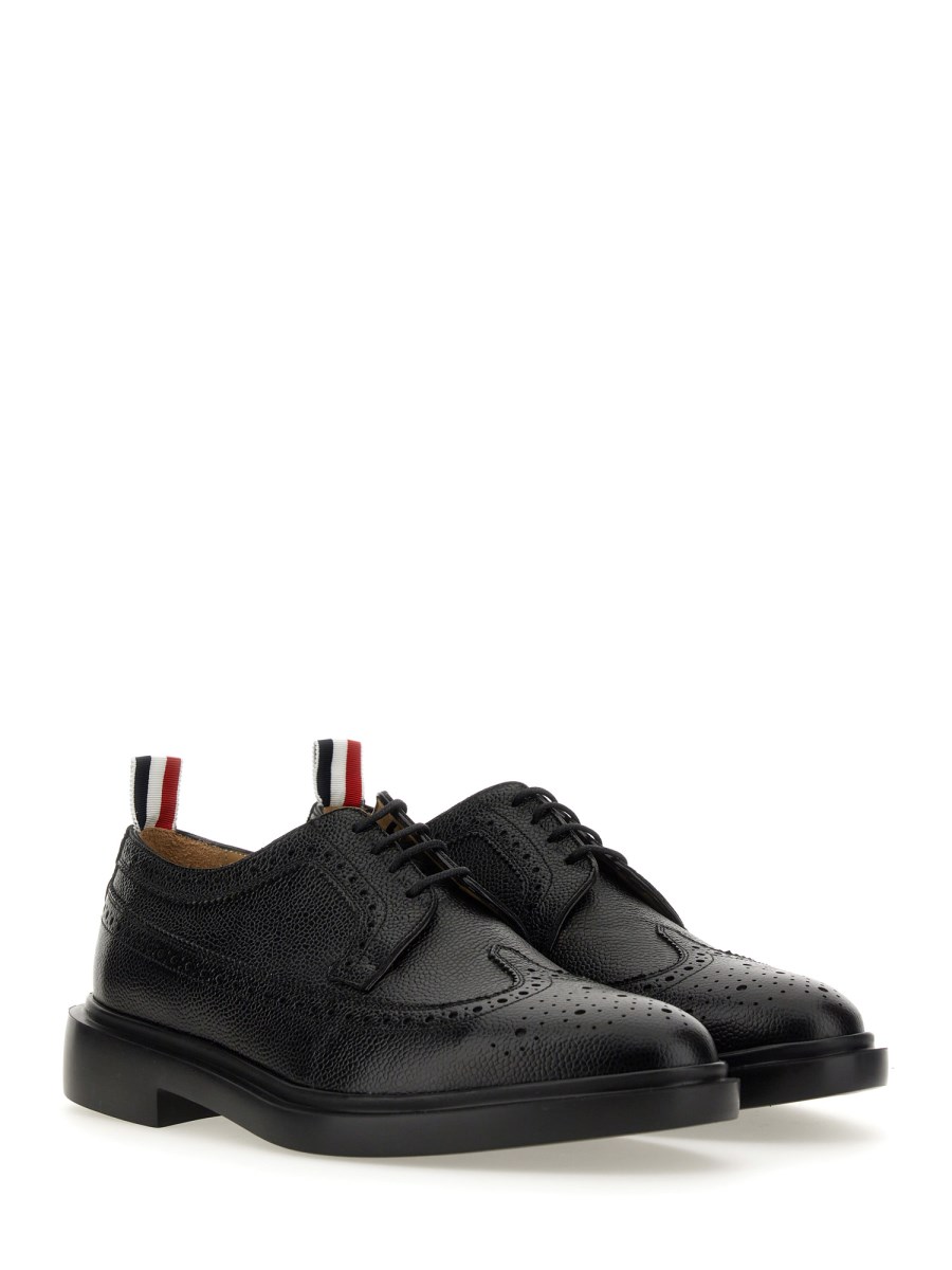 THOM BROWNE STRINGATA LONGWING BROGUE IN PELLE PEBBLE GRAIN