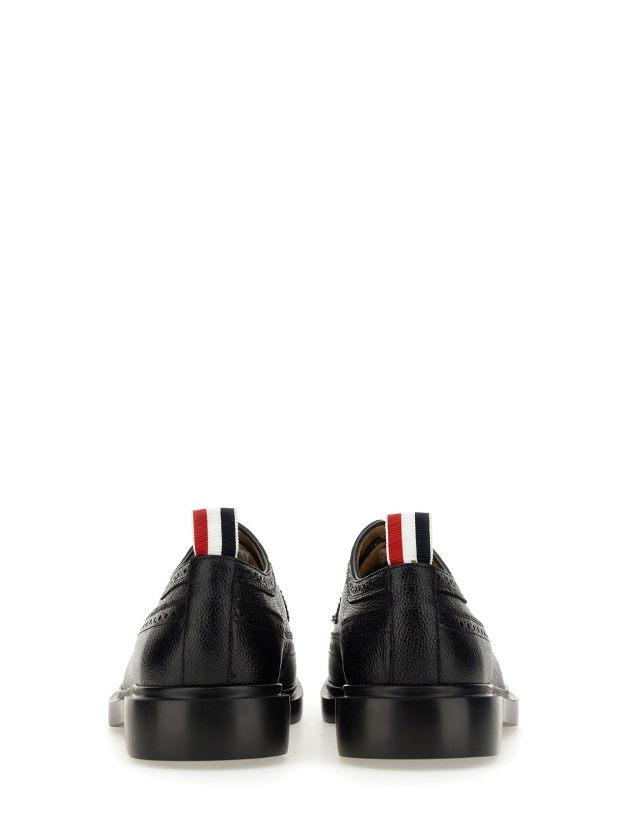 THOM BROWNE STRINGATA LONGWING BROGUE IN PELLE PEBBLE GRAIN