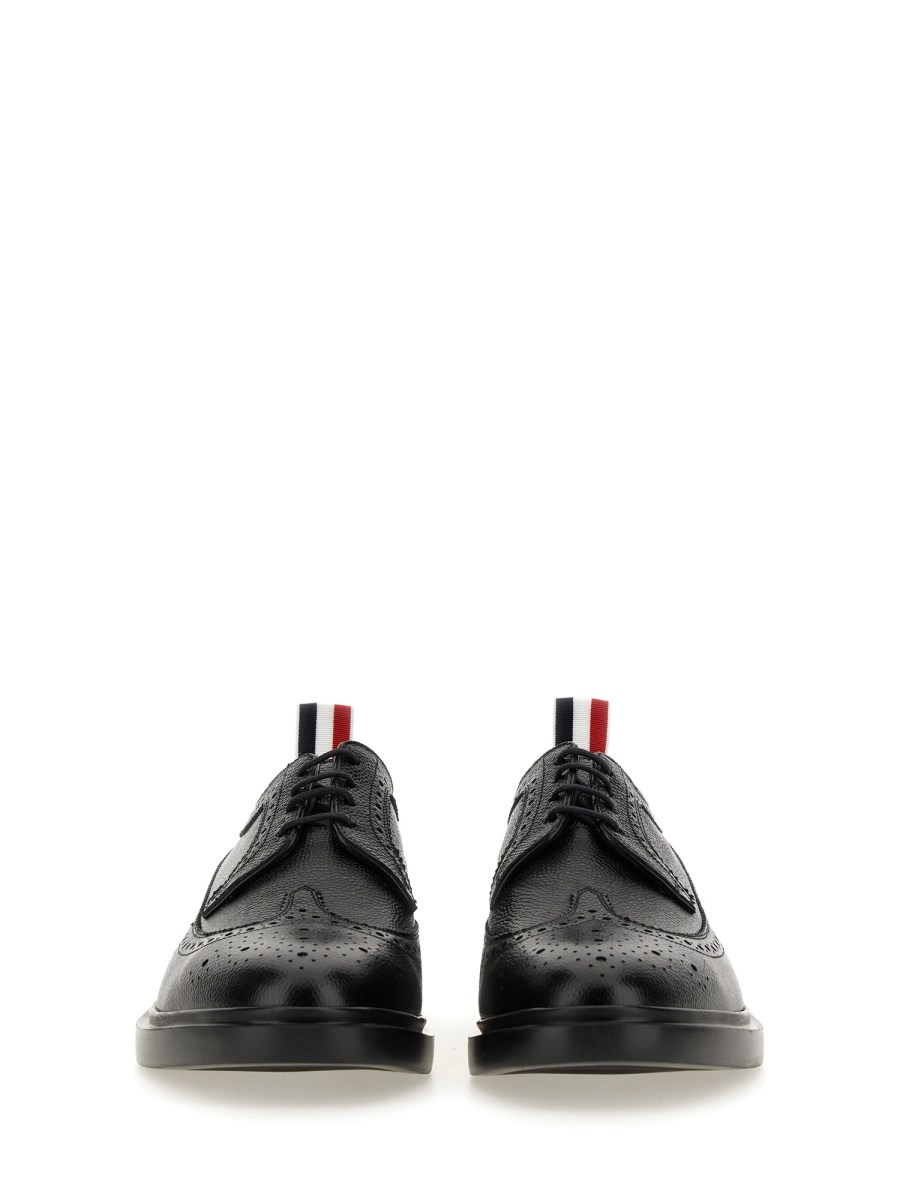 THOM BROWNE STRINGATA LONGWING BROGUE IN PELLE PEBBLE GRAIN
