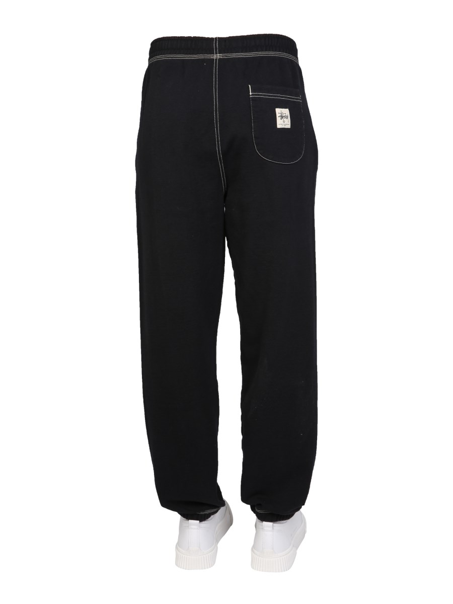 STUSSY PANTALONE JOGGING IN COTONE CON PATCH LOGO