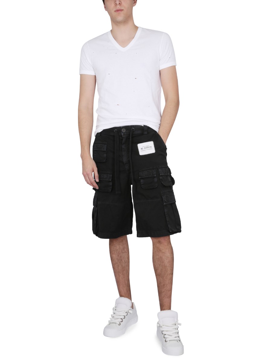 DOLCE & GABBANA T-SHIRT CON SCOLLO A V IN JERSEY DI COTONE LAVATO CON ROTTURE