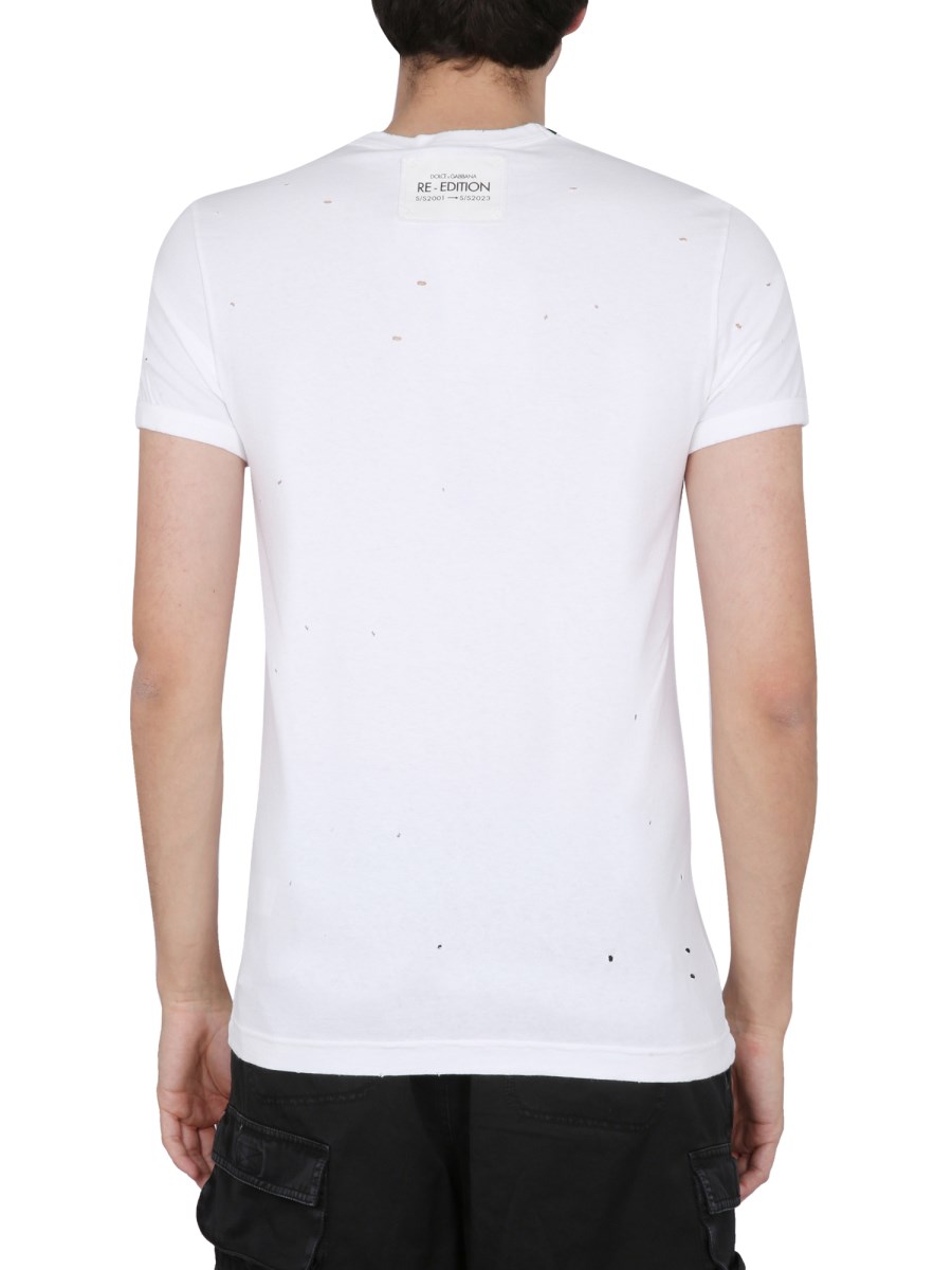 DOLCE & GABBANA T-SHIRT CON SCOLLO A V IN JERSEY DI COTONE LAVATO CON ROTTURE