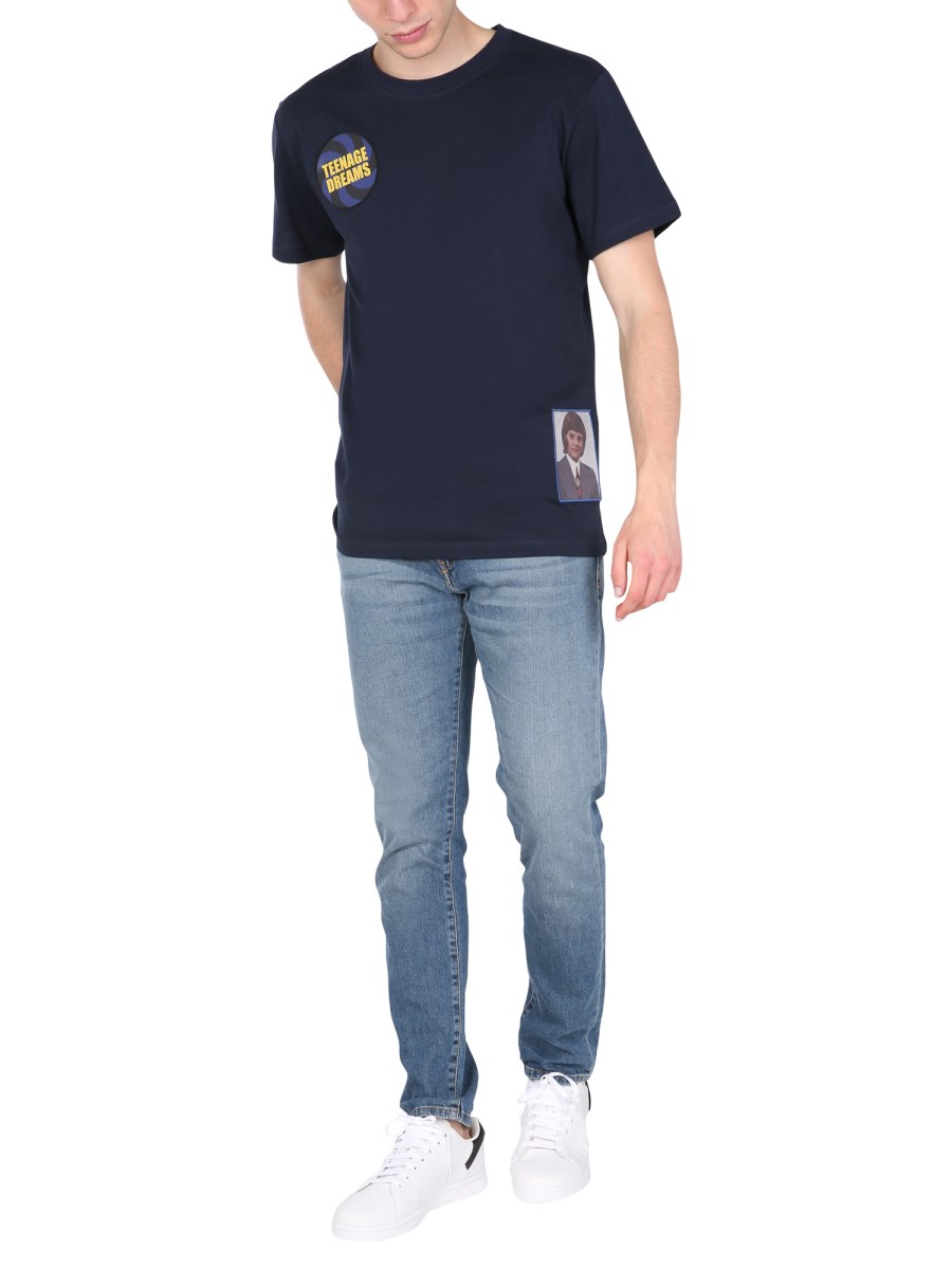RAF SIMONS T-SHIRT GIROCOLLO IN JERSEY DI COTONE CON PATCH "TEENAGE DREAMS"