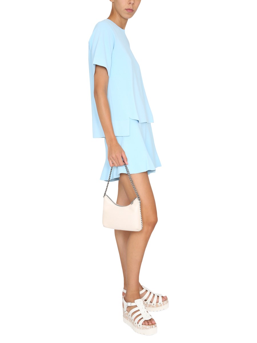 STELLA McCARTNEY T-SHIRT IN VISCOSA CON ORLO ASIMMETRICO