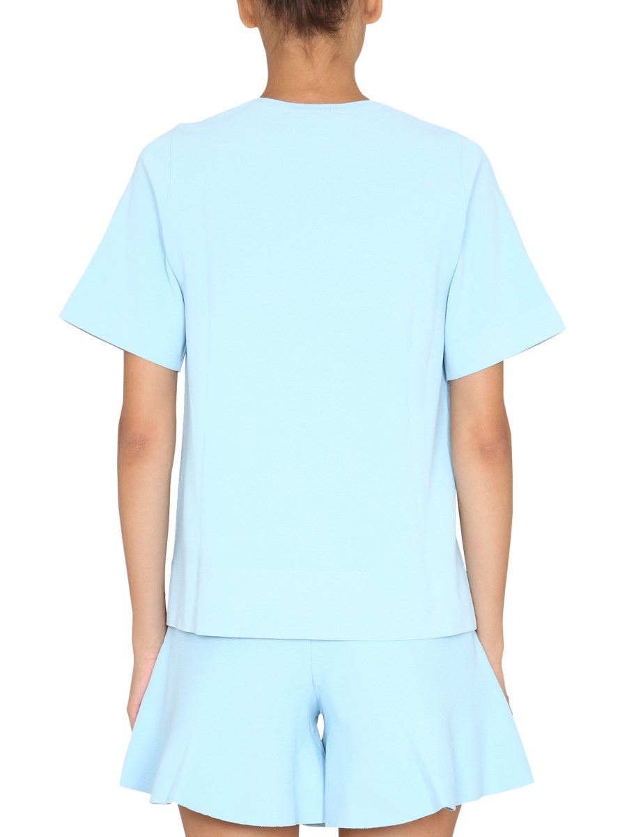 STELLA McCARTNEY T-SHIRT IN VISCOSA CON ORLO ASIMMETRICO