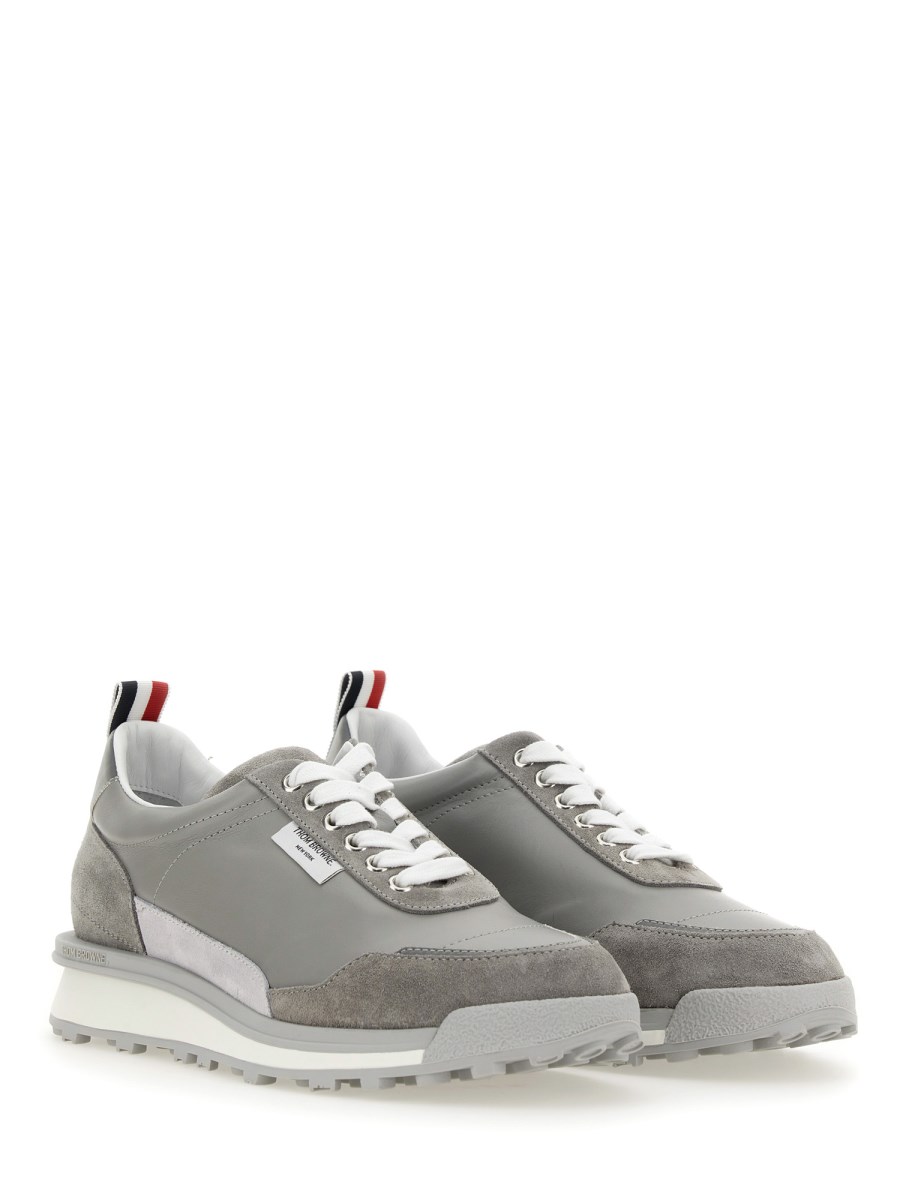 THOM BROWNE SNEAKER CON LOGO IN ECO NYLON E PELLE