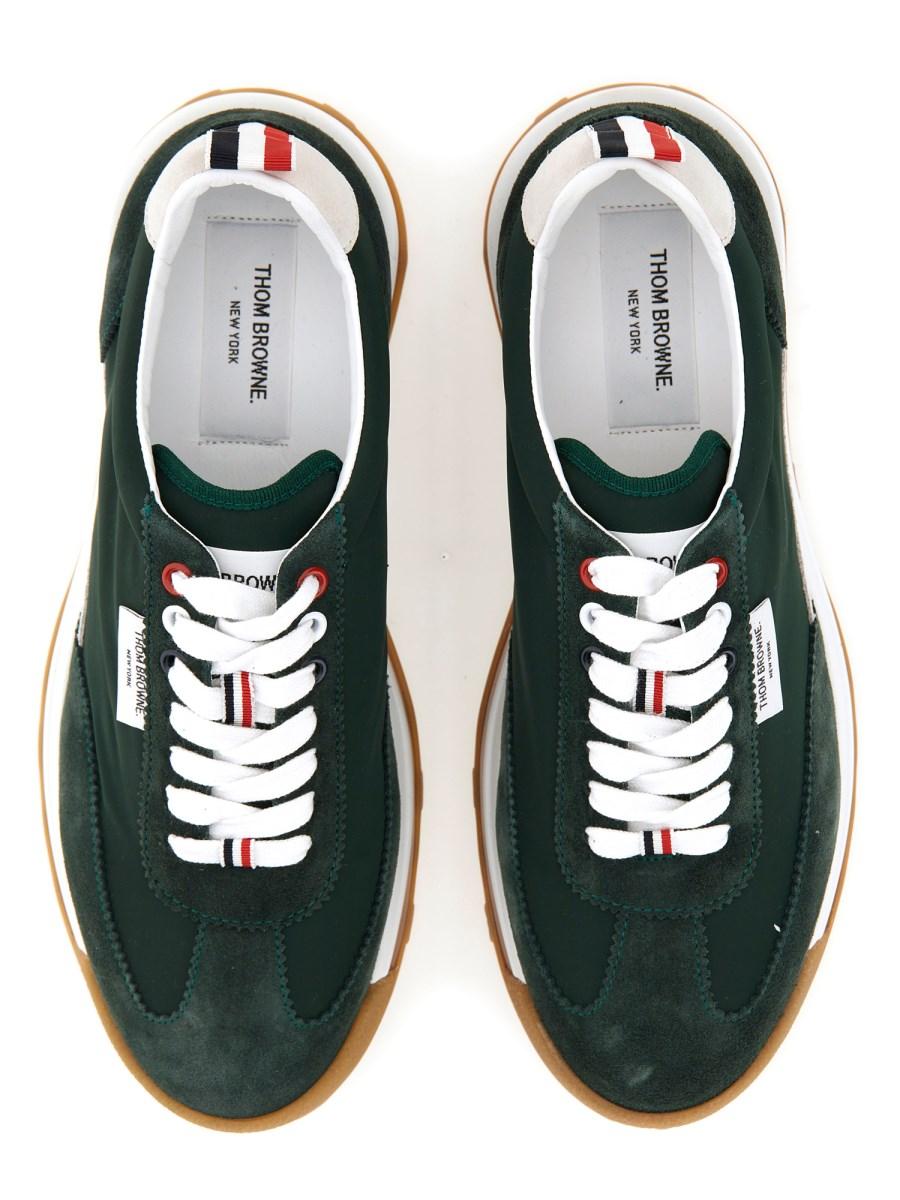 THOM BROWNE SNEAKER IN PELLE CON LOGO