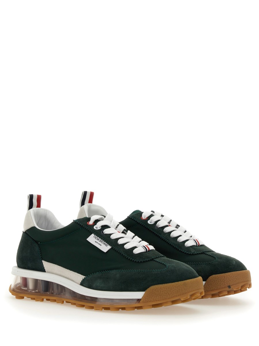 THOM BROWNE SNEAKER IN PELLE CON LOGO