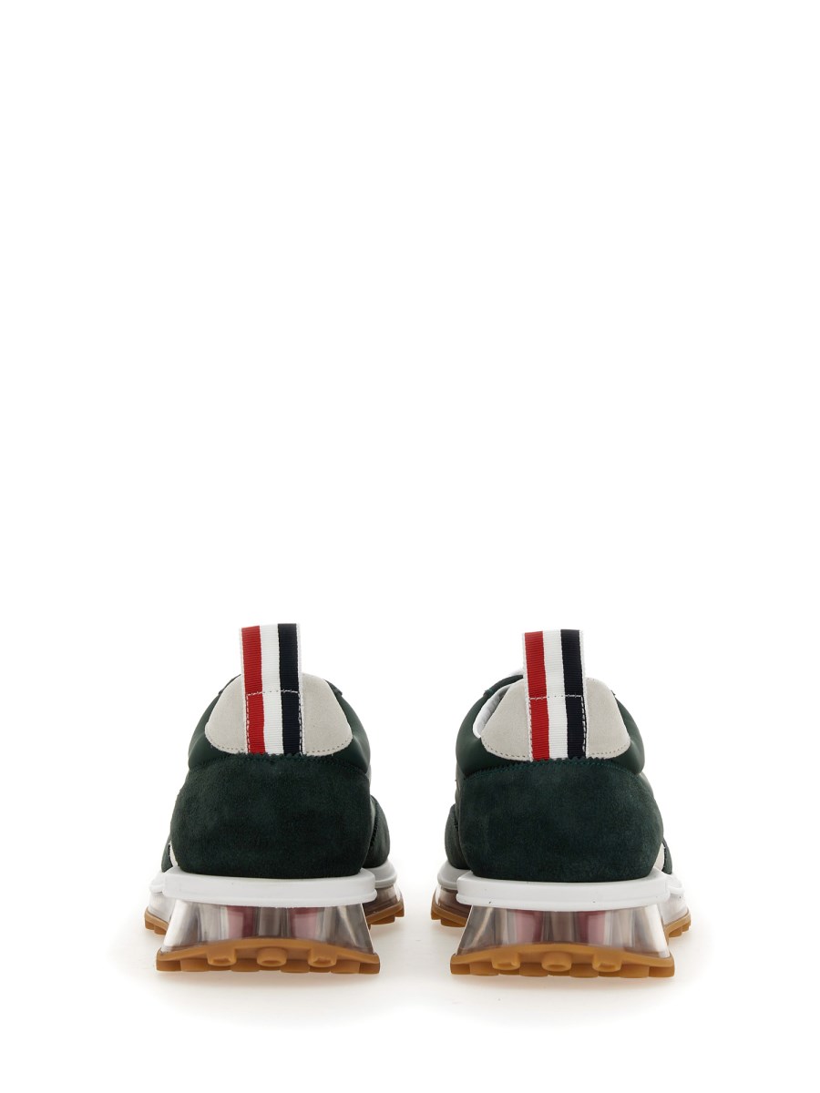 THOM BROWNE SNEAKER IN PELLE CON LOGO