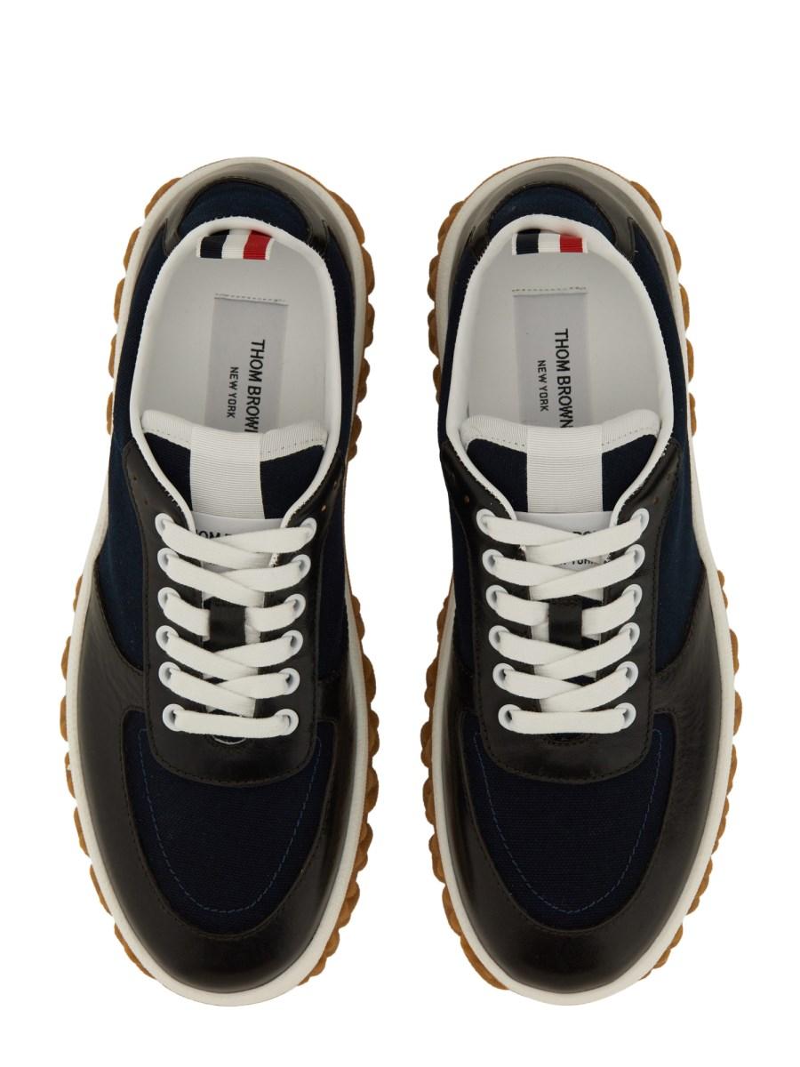 THOM BROWNE TRAINER LETTERMAN CON SUOLA CABLE KNIT IN CANVAS E PELLE
