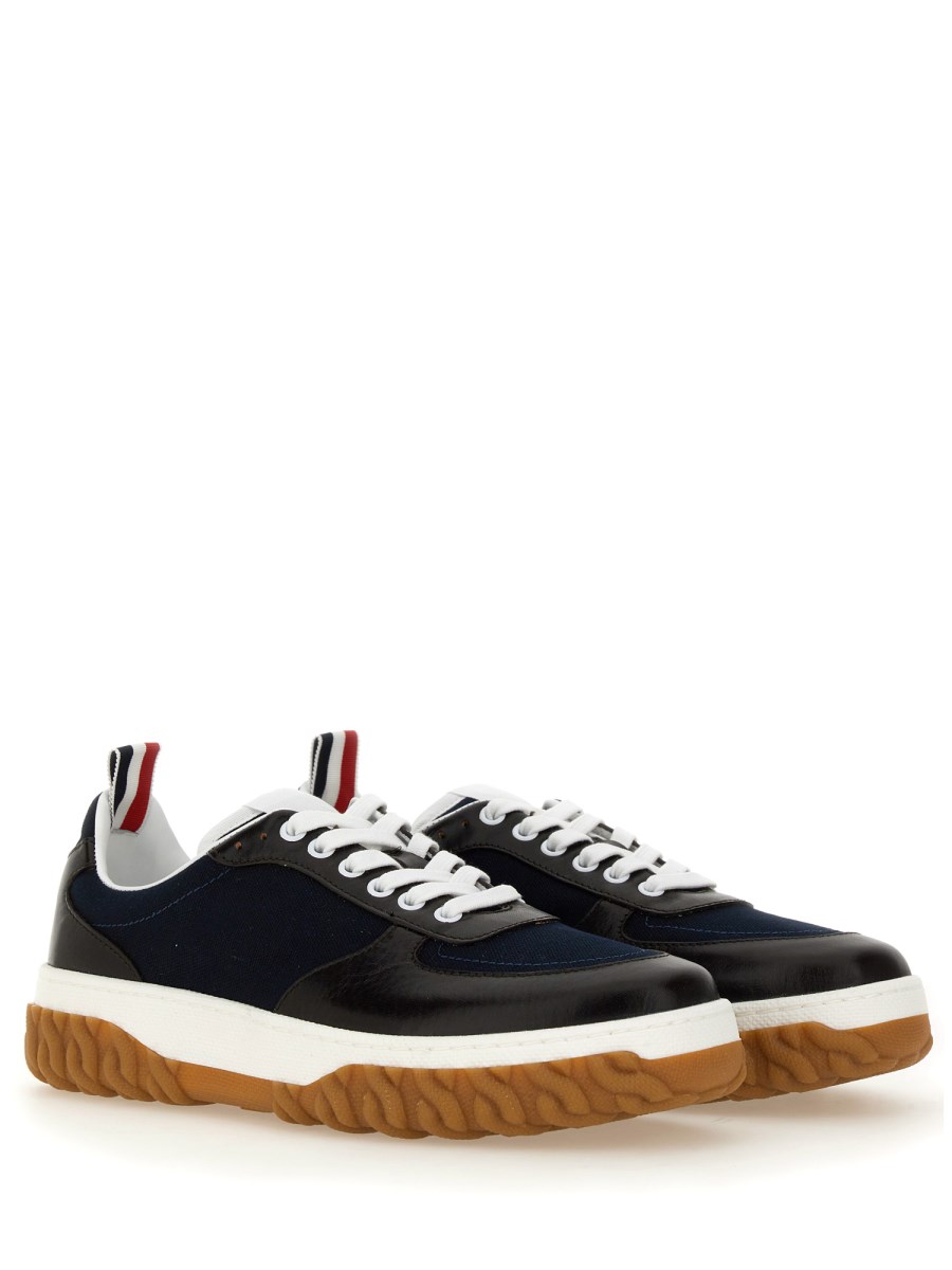 THOM BROWNE TRAINER LETTERMAN CON SUOLA CABLE KNIT IN CANVAS E PELLE