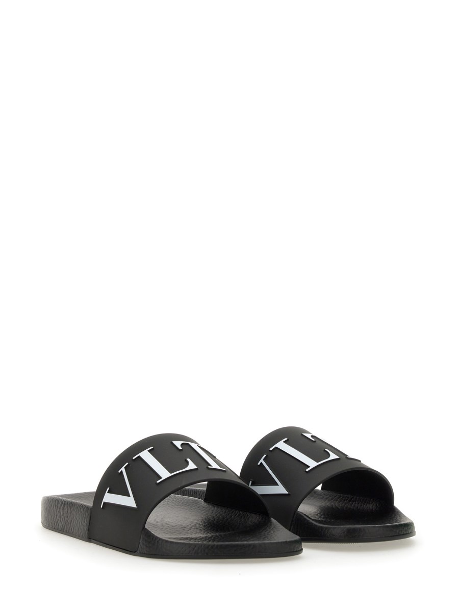 VALENTINO GARAVANI SANDALO SLIDE CON LOGO IN GOMMA