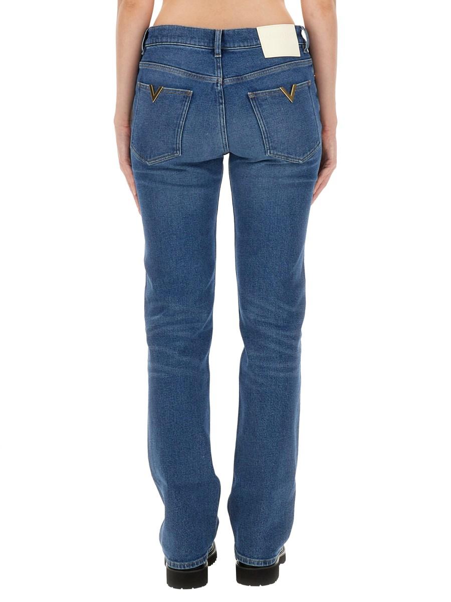 VALENTINO PANTALONE IN DENIM CON V DETAILS