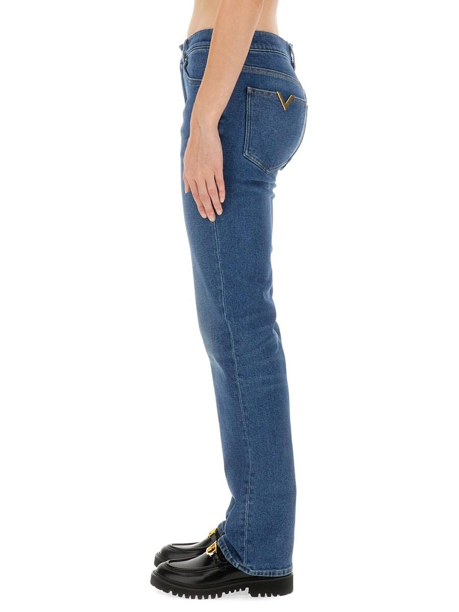 VALENTINO PANTALONE IN DENIM CON V DETAILS