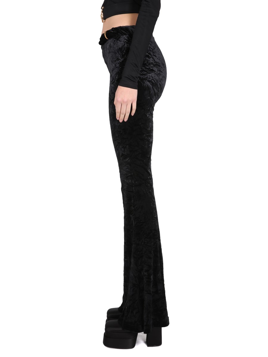 VERSACE PANTALONE SVASATO IN VELLUTO ARROTOLATI