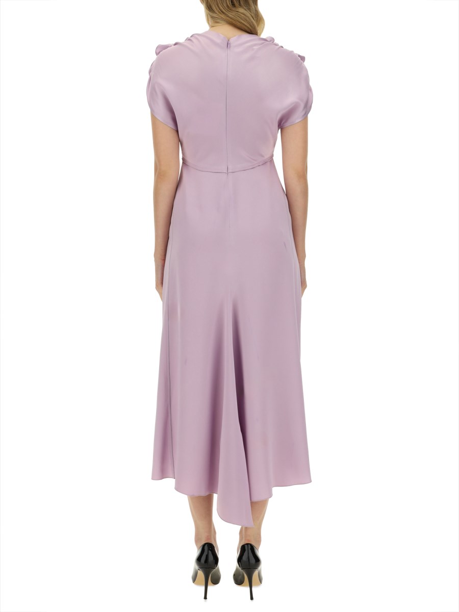VICTORIA BECKHAM ABITO CON SCOLLO A V