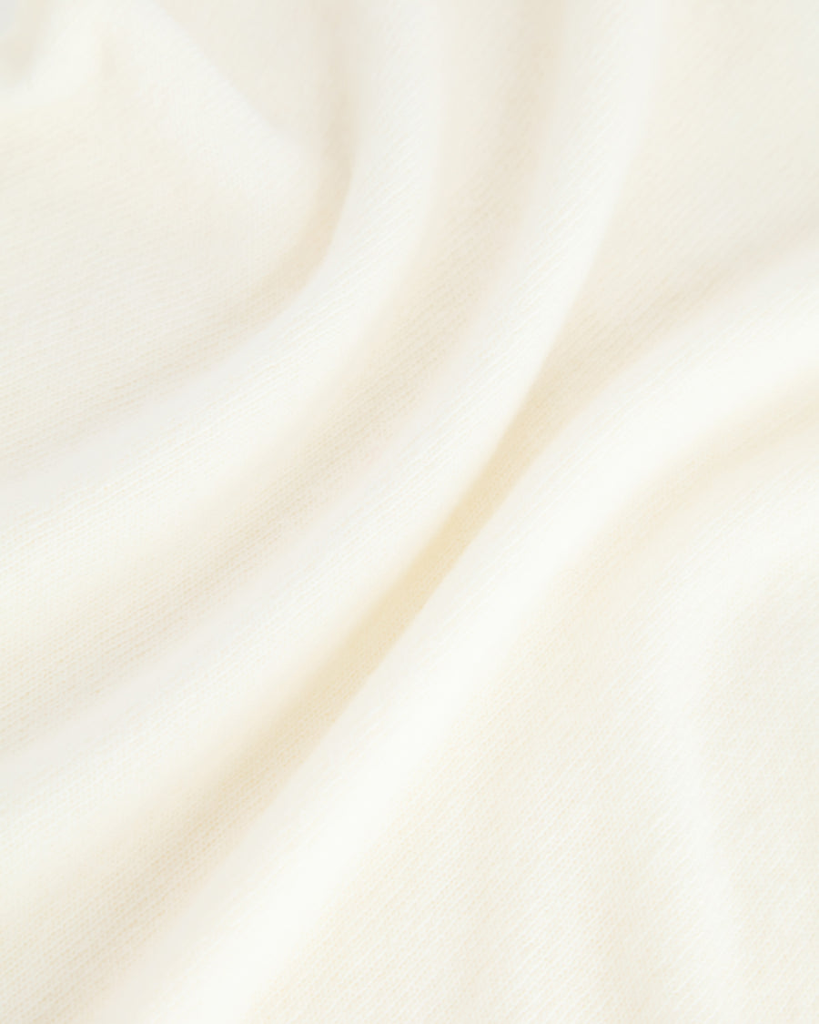 Scaglione TURTLE NECK SLIM RAGLAN SEAMLESS MILK