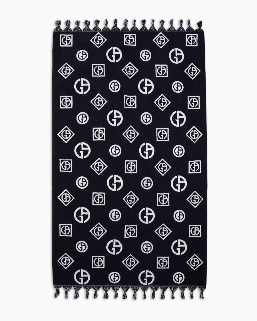 The World Of Armani TELO MARE IN SPUGNA DI COTONE JACQUARD LOGO ALL-OVER