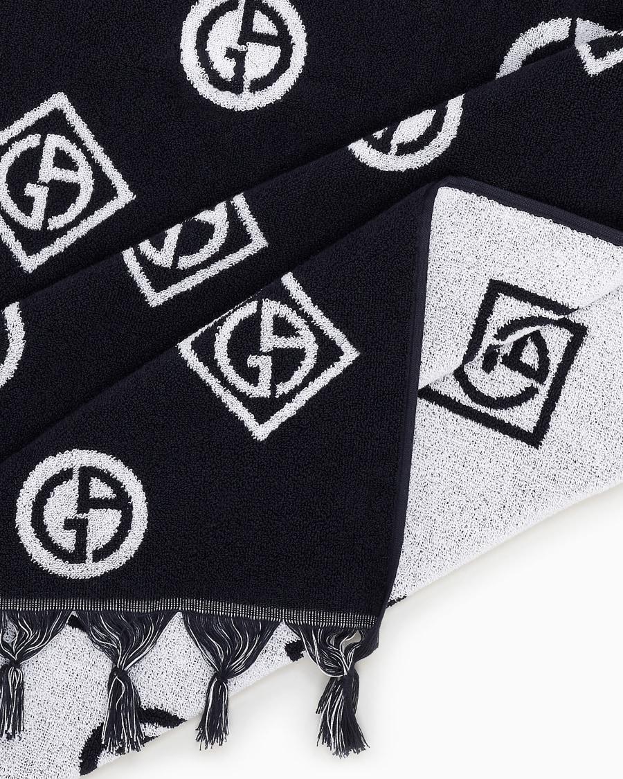 The World Of Armani TELO MARE IN SPUGNA DI COTONE JACQUARD LOGO ALL-OVER