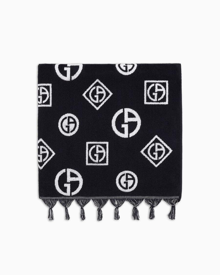 The world of armani TELO MARE IN SPUGNA DI COTONE JACQUARD LOGO ALL-OVER