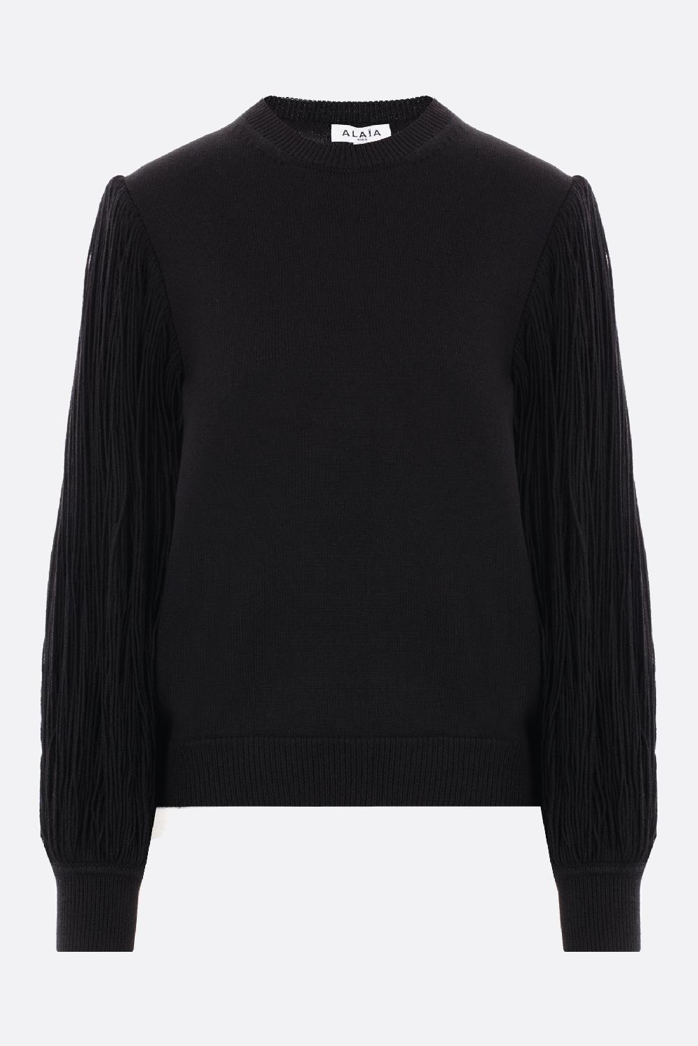 ALAIA pullover in lana con maniche a frange