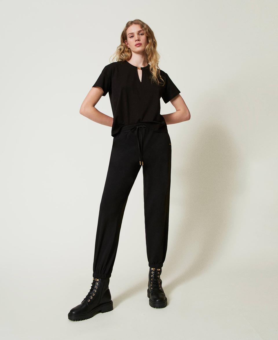 Twin Set Pantaloni joggers in felpa con raso