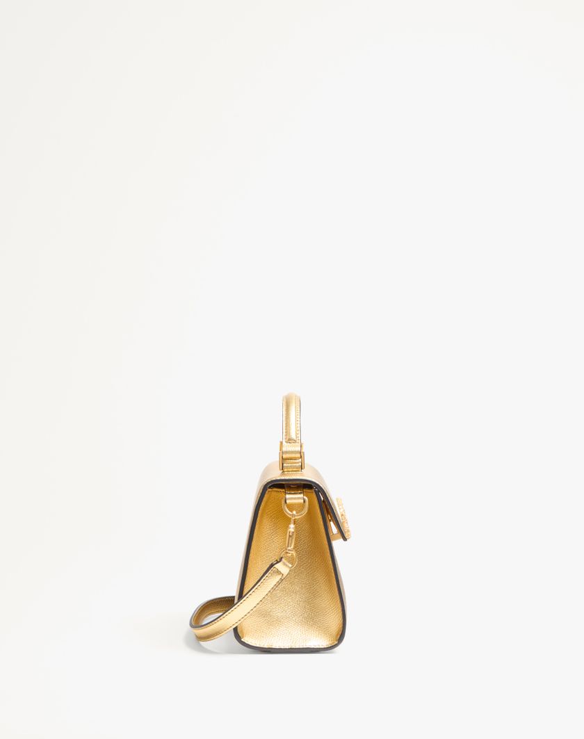 Valentino Handbags Borsa A Mano Mini Valentino Garavani Vsling In Vitello Granato Laminato Con Logo Gioiello Per Donna In Antique Brass | Valentino IT