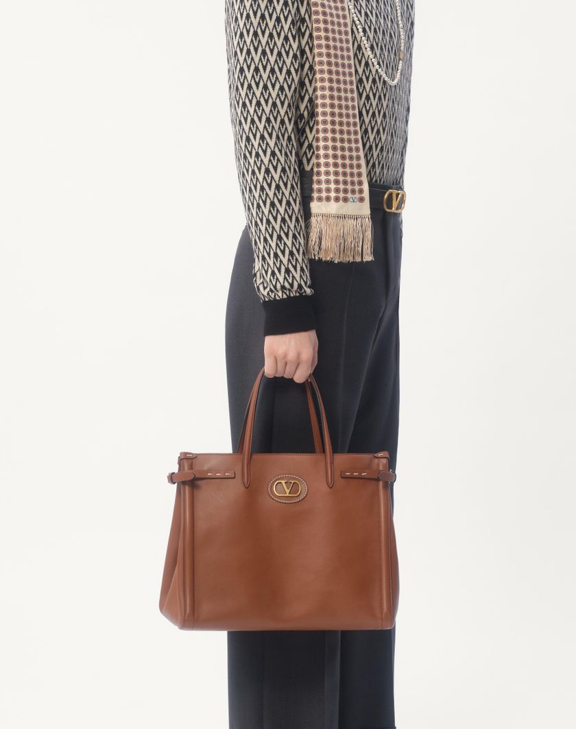 Valentino Handbags Maglione Girocollo In Lana Con Motivo Jacquard Toute La V Per Uomo In Nero/crema | Valentino IT