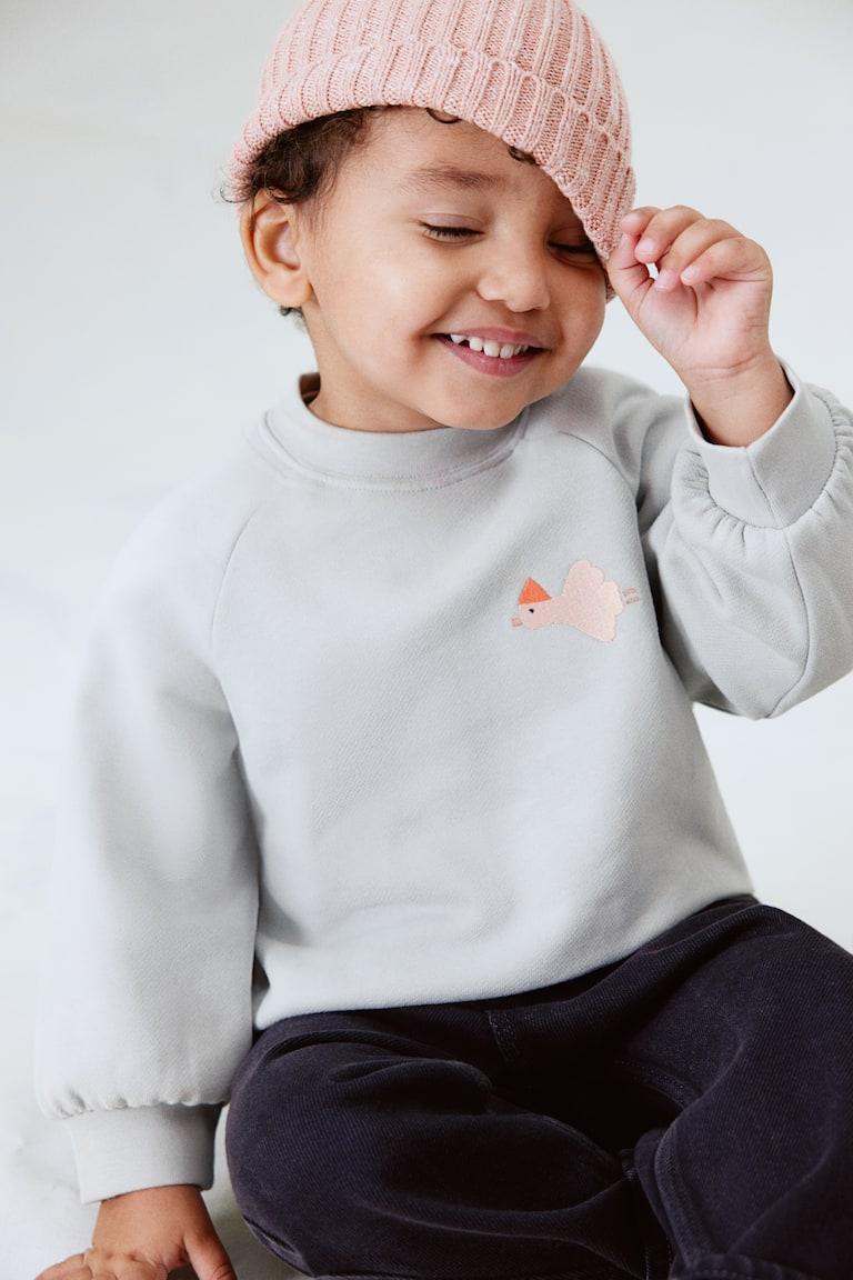 H&M Felpa in cotone con dettaglio ricamato - Grigio chiaro/uccello - BAMBINO
