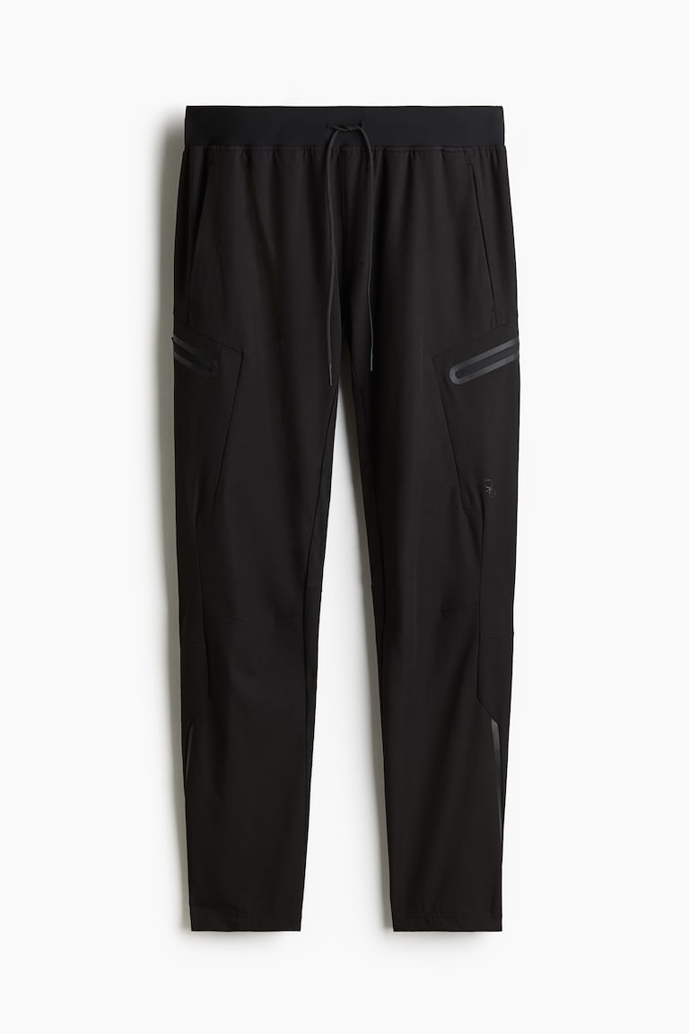 H&M Joggers sportivi Slim Fit con DryMove™ - Grigio scuro - UOMO