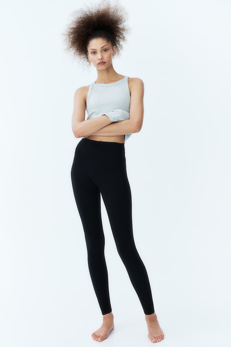 H&M Leggings da yoga con SoftMove™ Lycra® - Nero - DONNA
