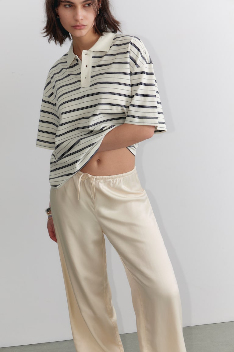 H&M Polo a righe con vestibilità relaxed - Nero spento e bianco a righe - DONNA