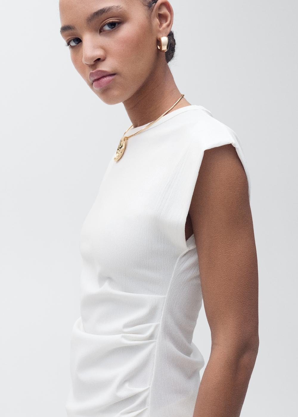 Mango Maglietta drappeggiata senza maniche