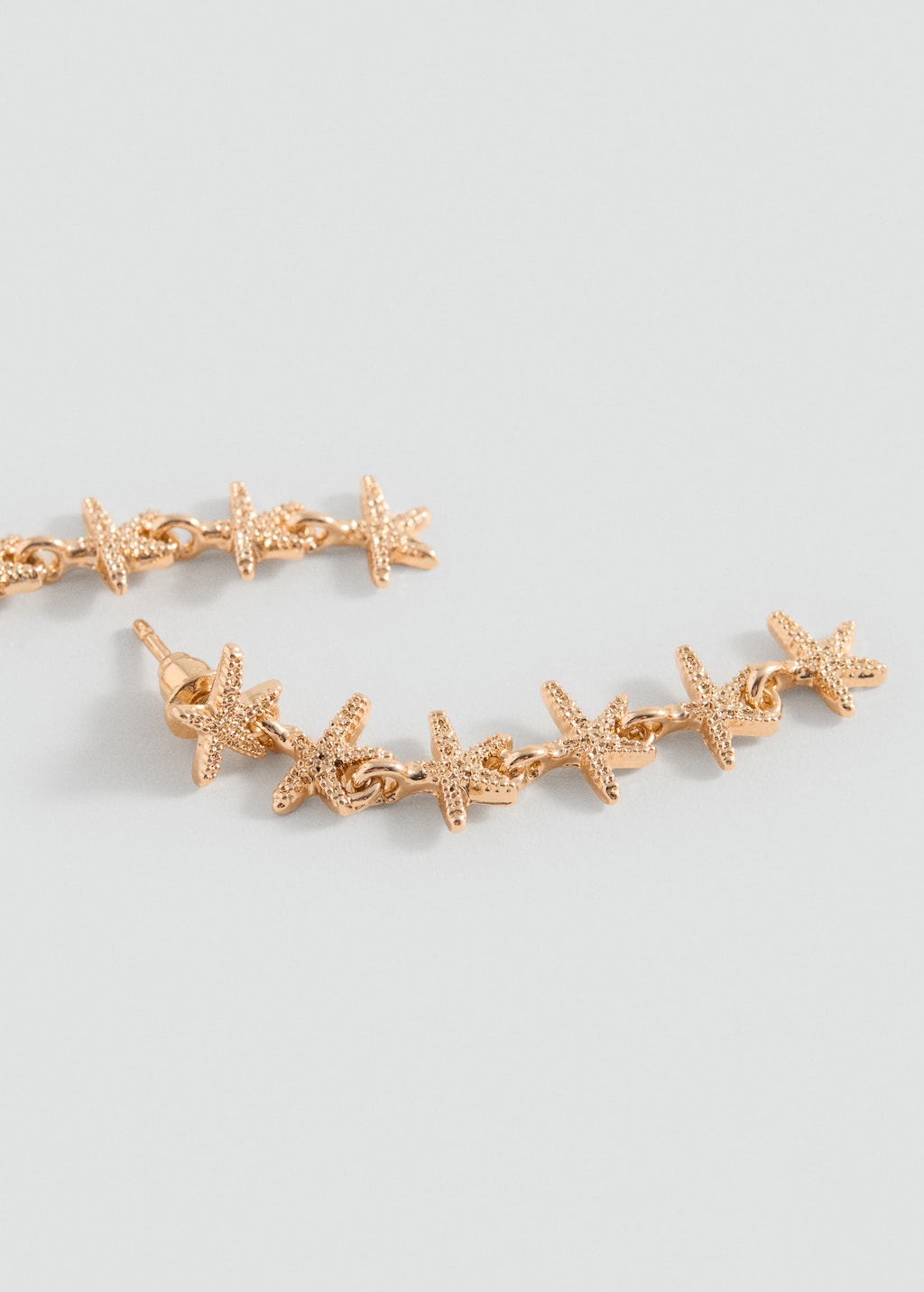 Mango Orecchini lunghi stelle