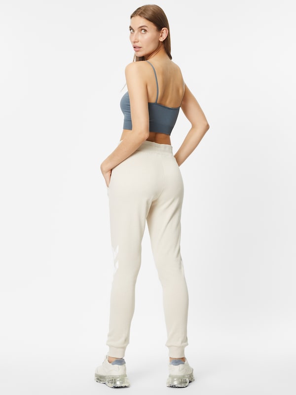 Hummel Tapered Pantaloni Sportivi 'Legacy' In Beige Chiaro