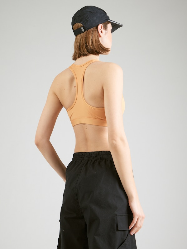 NIKE Bustino Reggiseno Sportivo 'Swoosh' In Arancione Pastello