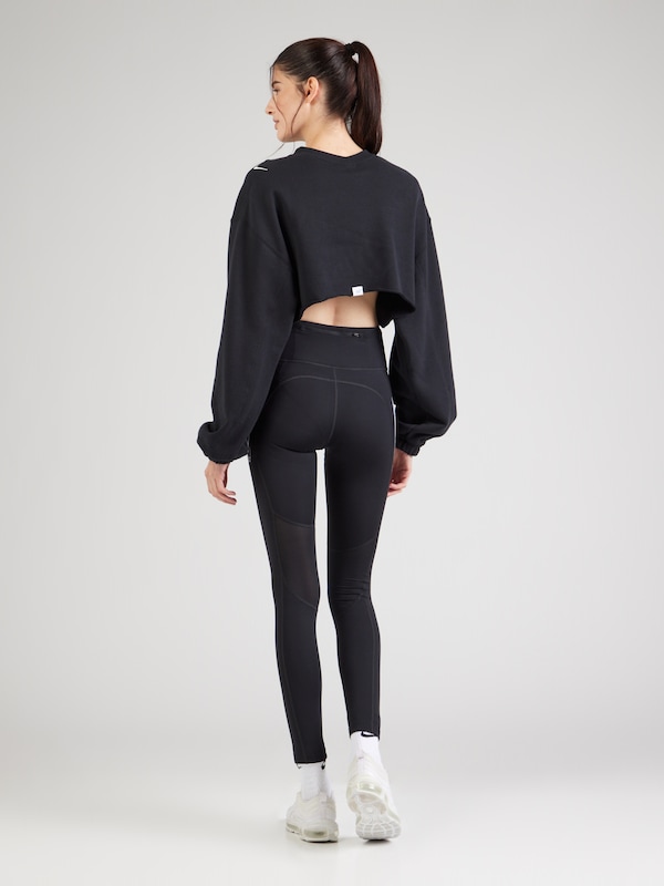 NIKE Skinny Pantaloni Sportivi 'FAST' In Nero