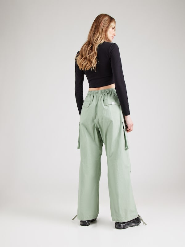 Nike Sportswear Loosefit Pantaloni Cargo In Verde Pastello