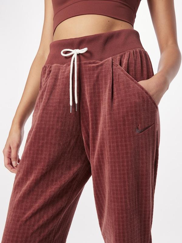Nike Sportswear Tapered Pantaloni Con Pieghe In Ruggine