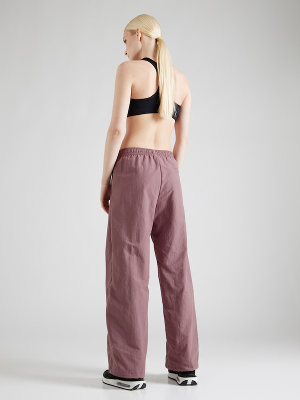 Nike Sportswear Wide Leg Pantaloni Con Piega Frontale In Marrone