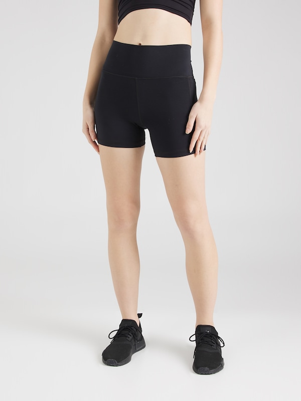 UNDER ARMOUR Skinny Pantaloni Sportivi 'Meridian Middy' In Nero