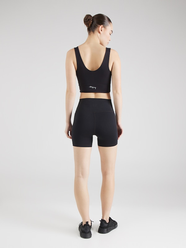 UNDER ARMOUR Skinny Pantaloni Sportivi 'Meridian Middy' In Nero