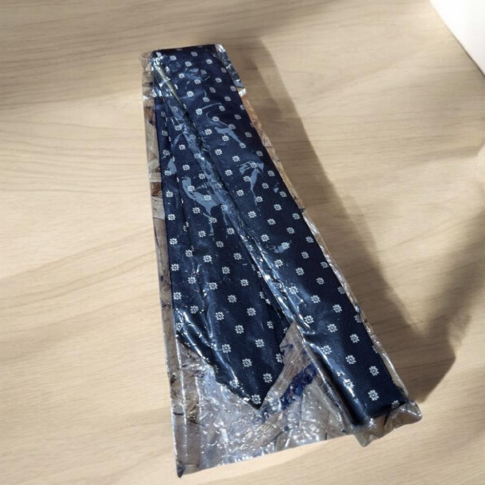 Mercatopoli CRAVATTA U BORRELLI BLU CON FIORELLINI BIANCHI